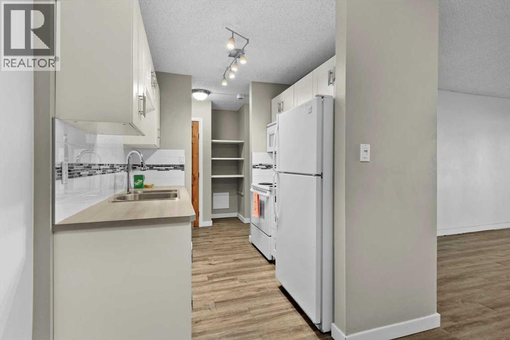 #110 816 89 Avenue SW - 9