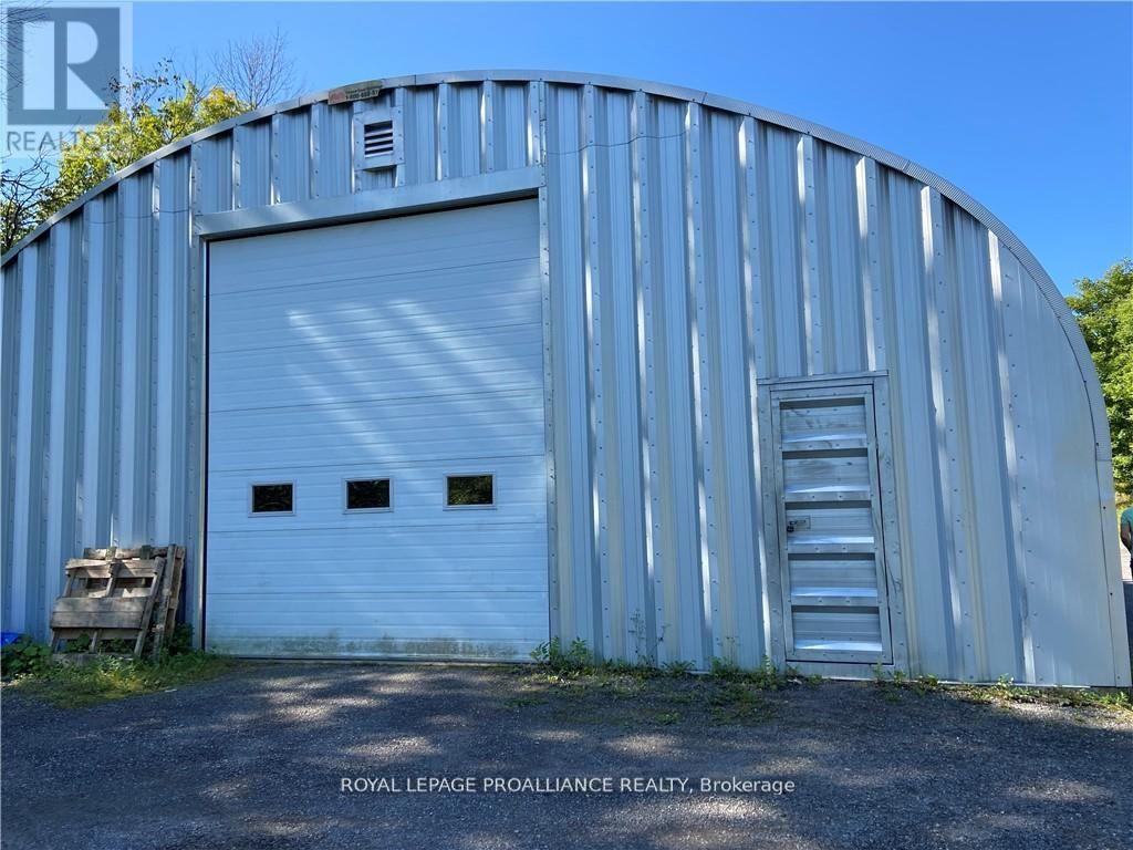 Quonset storage building at rear of lot