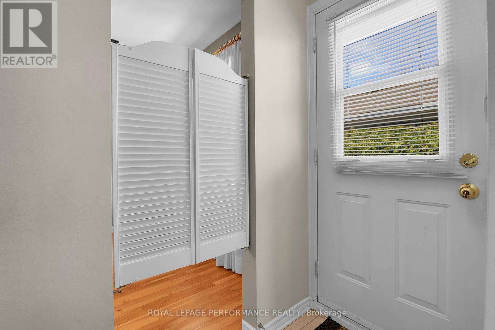 Door to fenced back yard