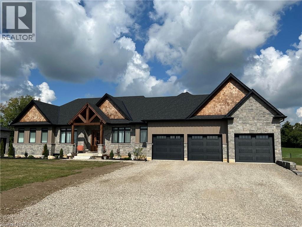Stone and wood-shingle exterior with a prominent timber-frame entry