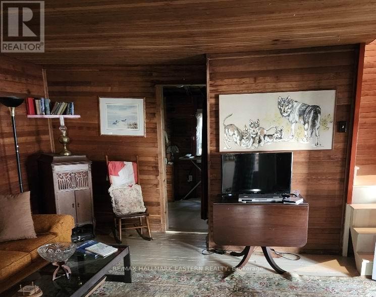 Living room leading to upper level