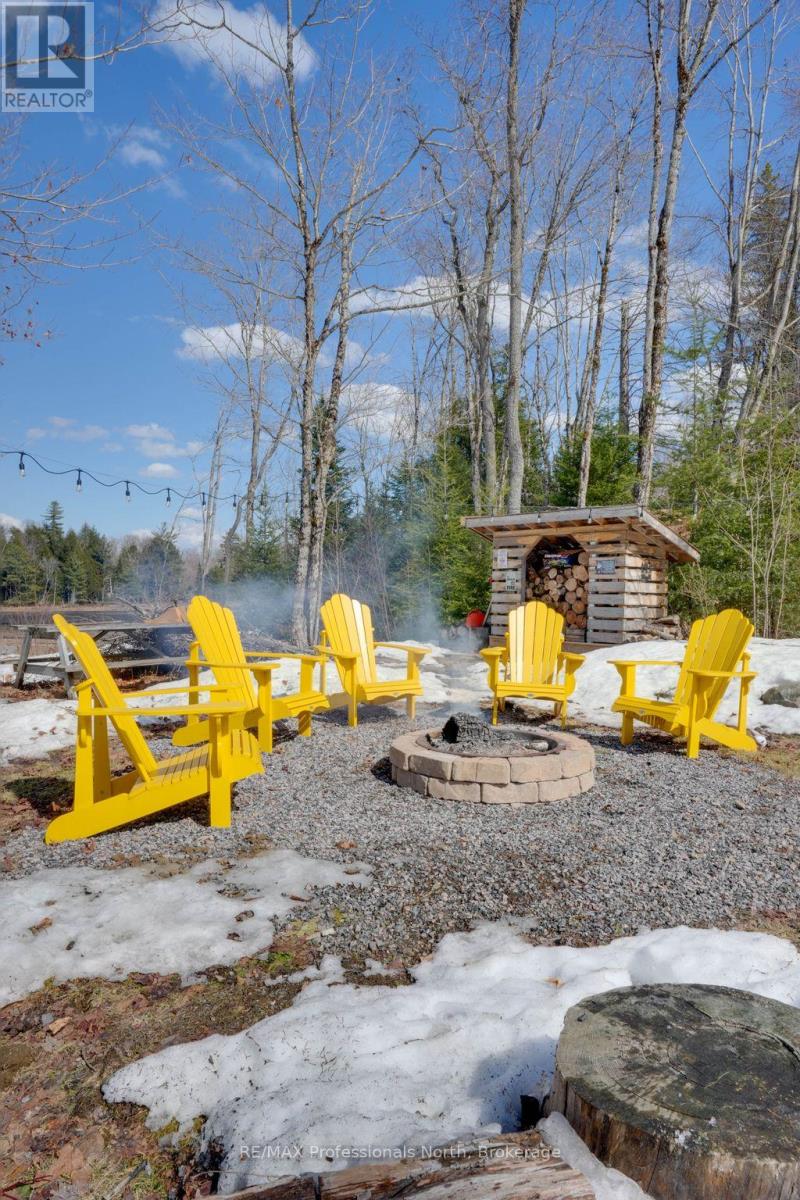 Rear Fire pit and enjoyment space.