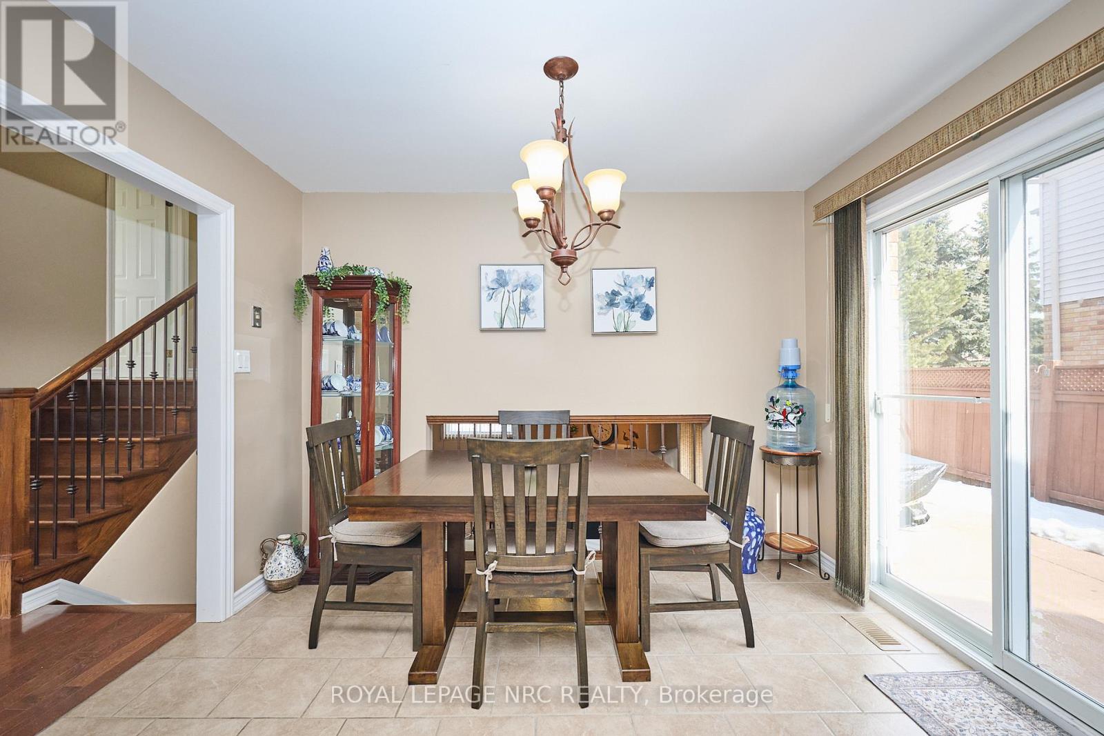 Open rail to lower level and access to patio.