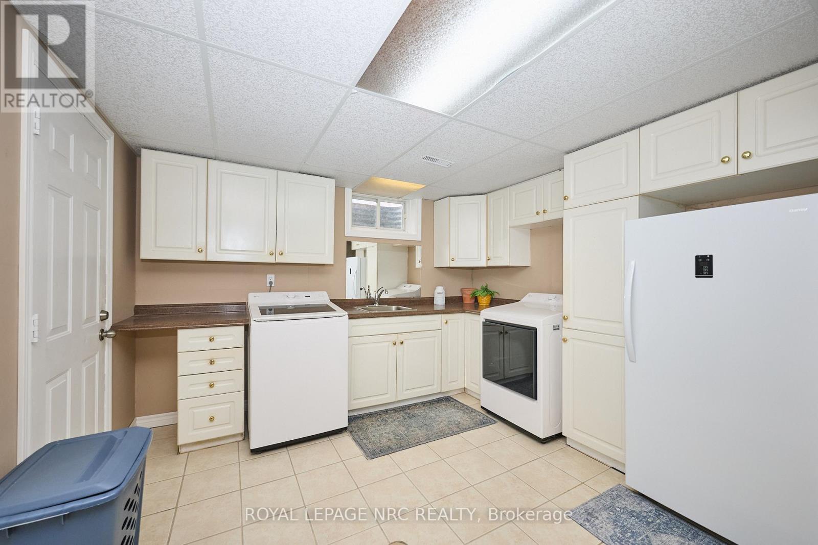 Lots of storage in laundry area.