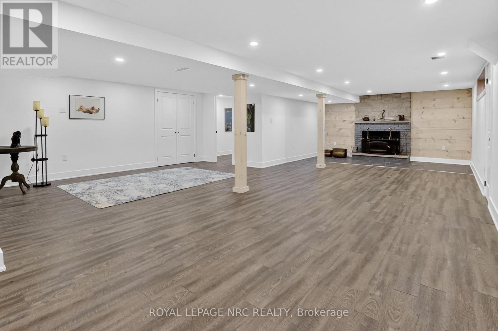 LOTS OF ROOM IN THE L-SHAPED REC ROOM