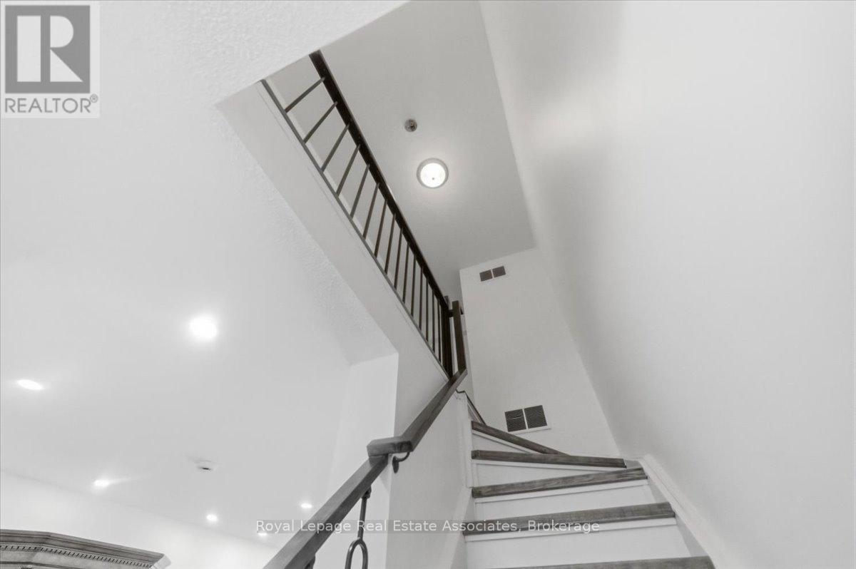 Oak and Metal Picket Staircase