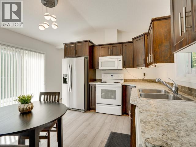104-8430 SPRINGBROOK ROAD - 1