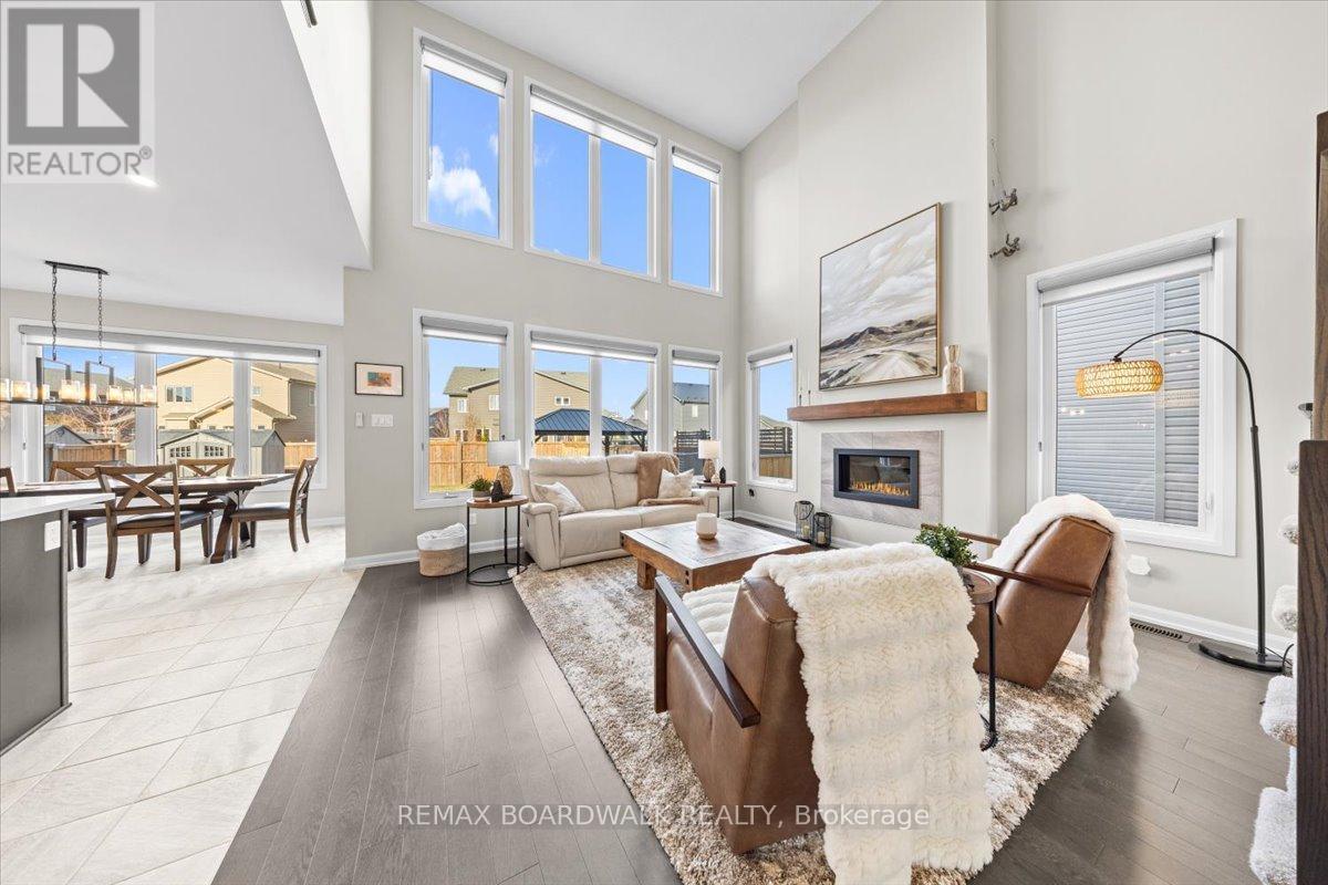 Two storey great room - floor to ceiling windows