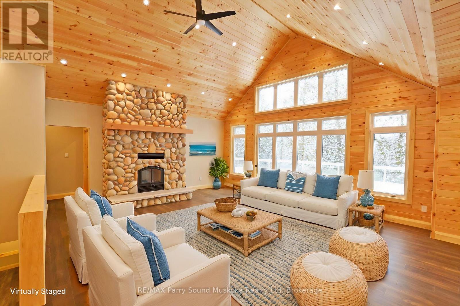 Great rm features Wood Burning Fireplace - staged