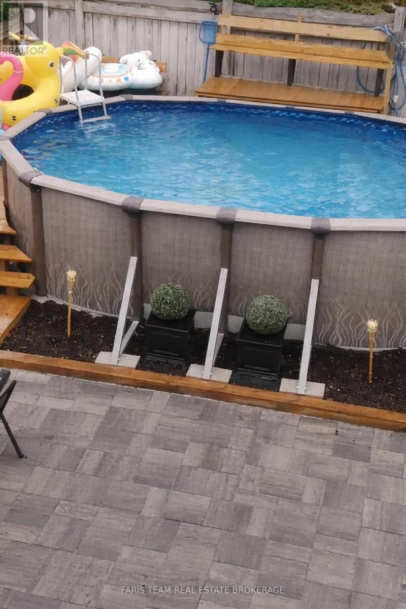 203 THRUSHWOOD DRIVE — photo 32