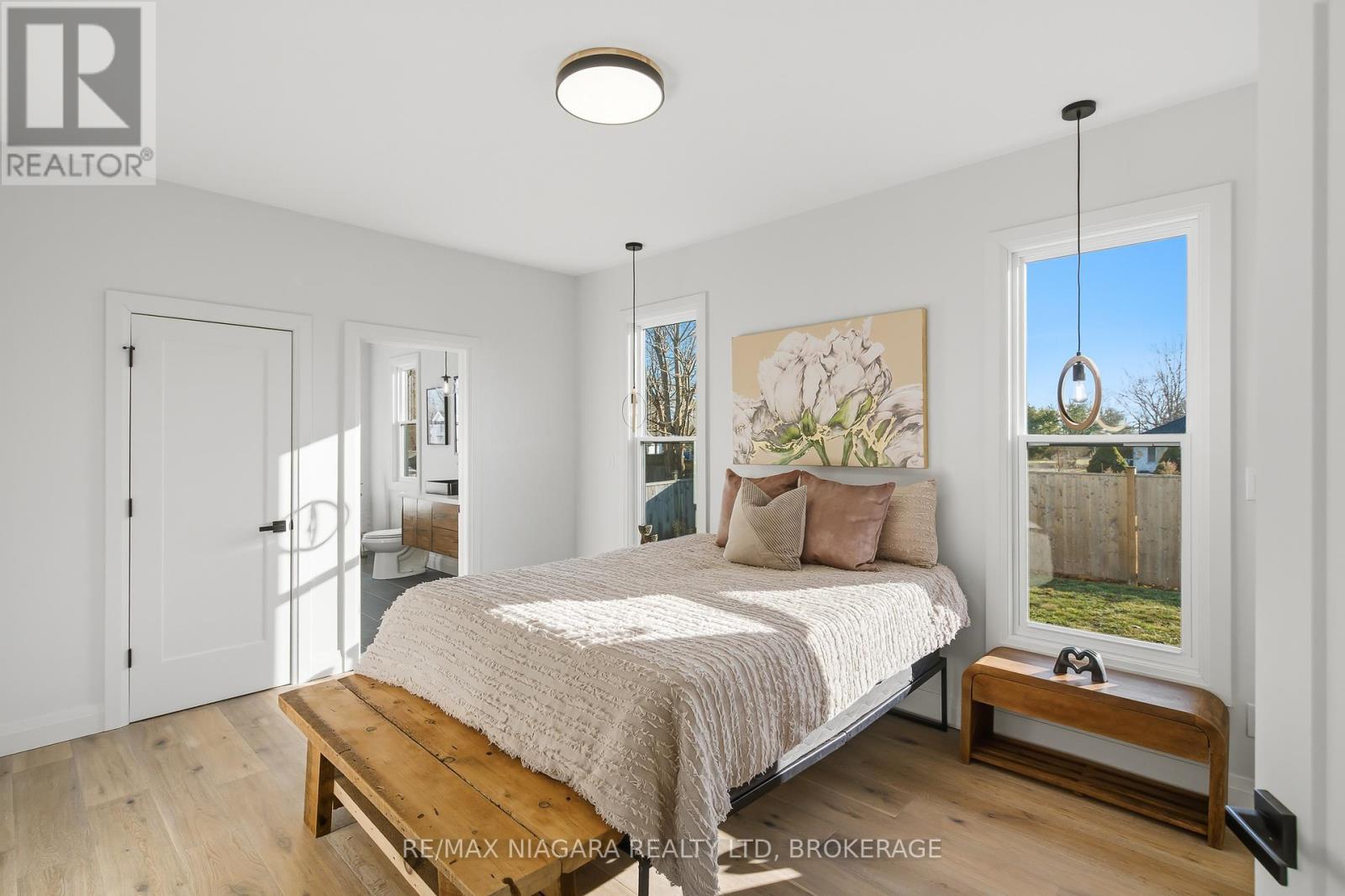 PRIMARY BEDROOM WITH 5 PC ENSUITE & WALK IN CLOSET