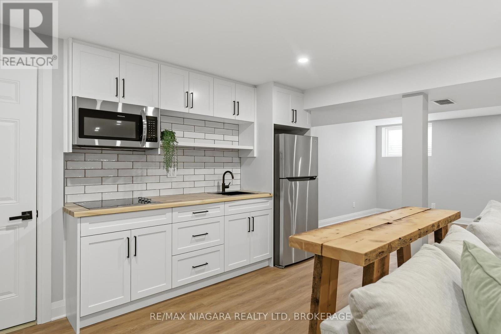 STOVE TOP WITH SINK KITCHEN IN BASEMENT
