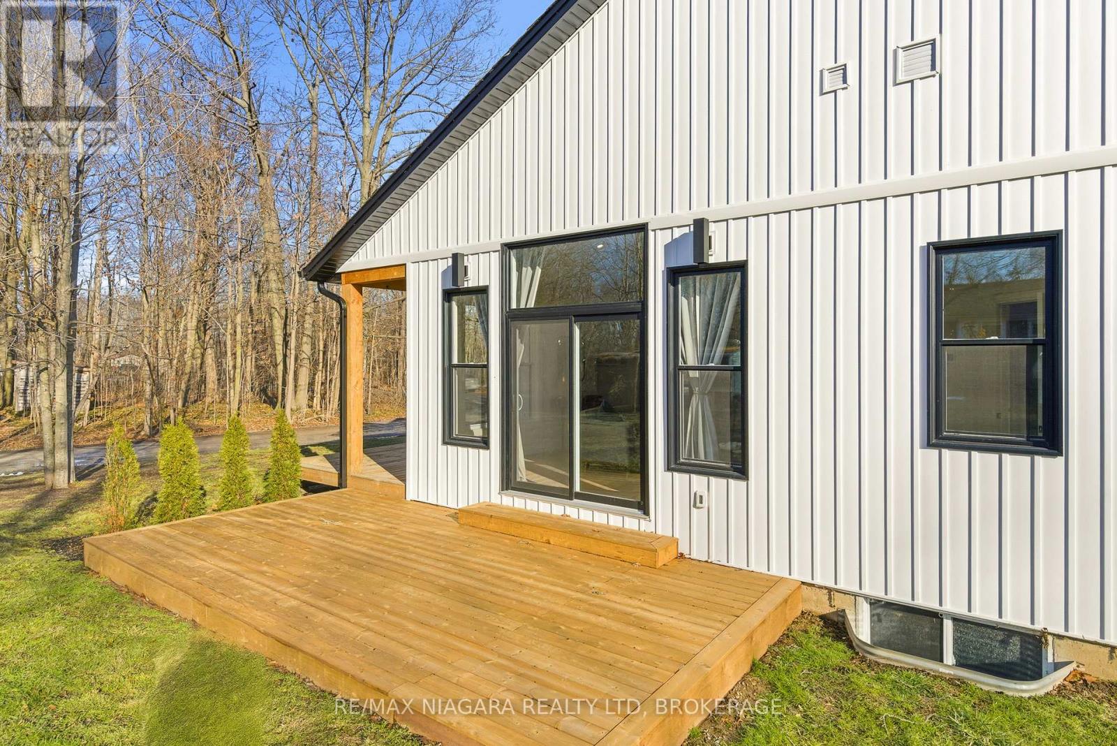 PRESSURE TREATED DECK OFF THE LIVING ROOM