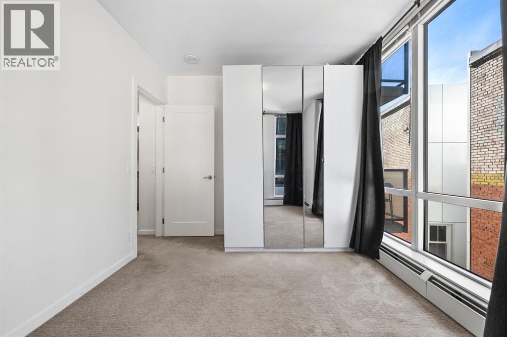 #306 450 8 AVENUE SE - 14