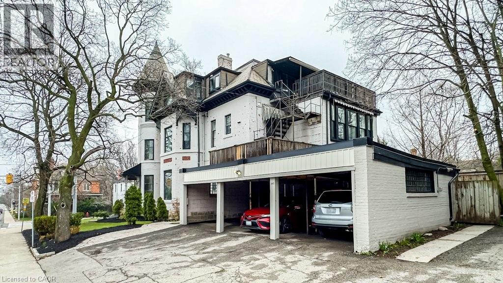3 car carport + parking for 5 cars beside