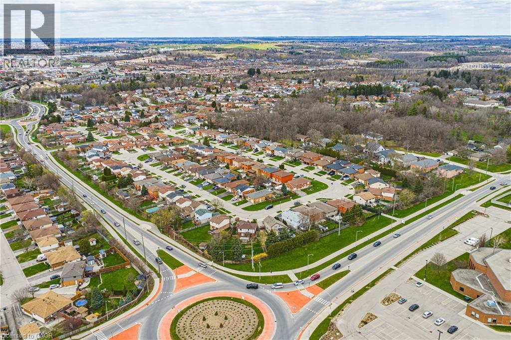 Aerial perspective showcasing a developed residential area with numerous single-family homes