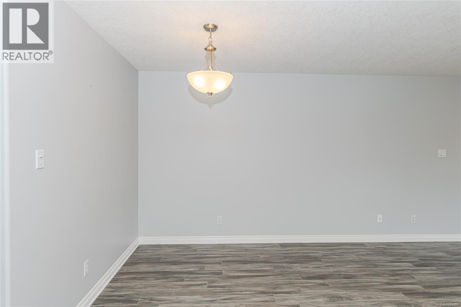 Plenty of electric outlets lends to versatile furniture arrangements. Virtually staged.