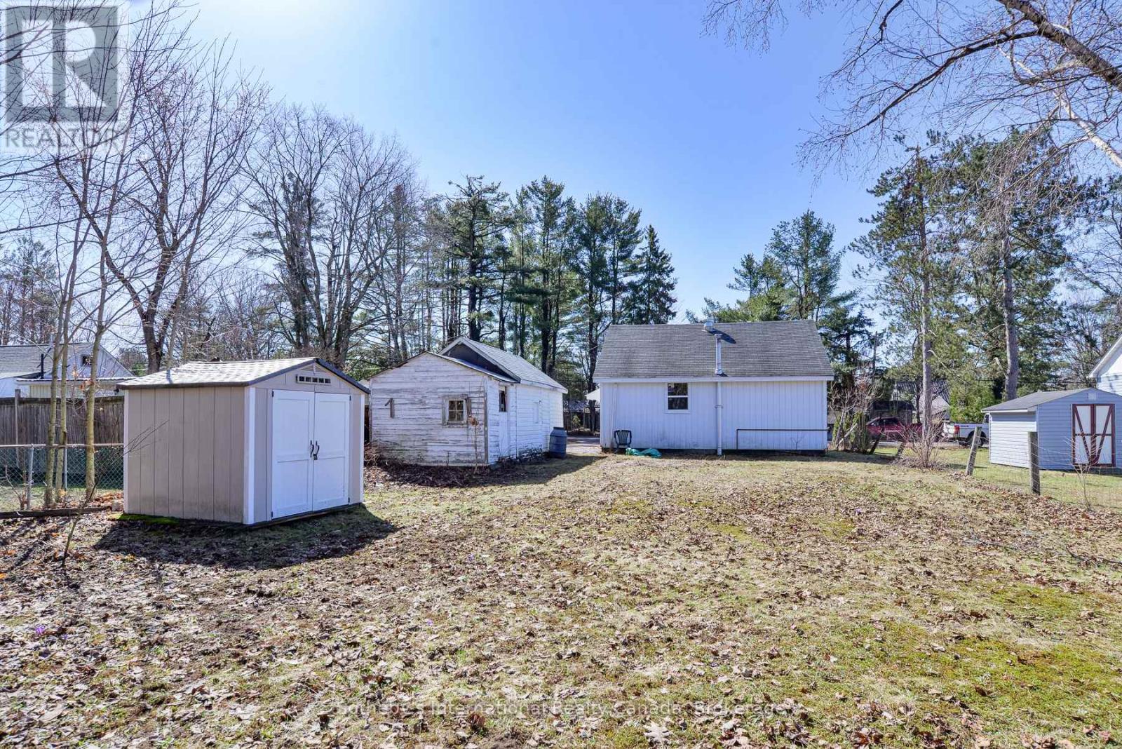 Utility shed + detached garage.