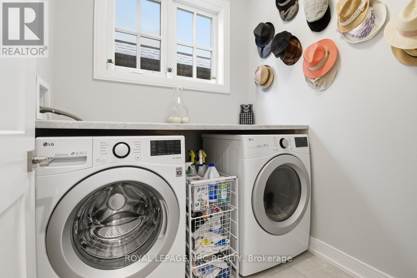 Main Floor Laundry with windows & folding counter