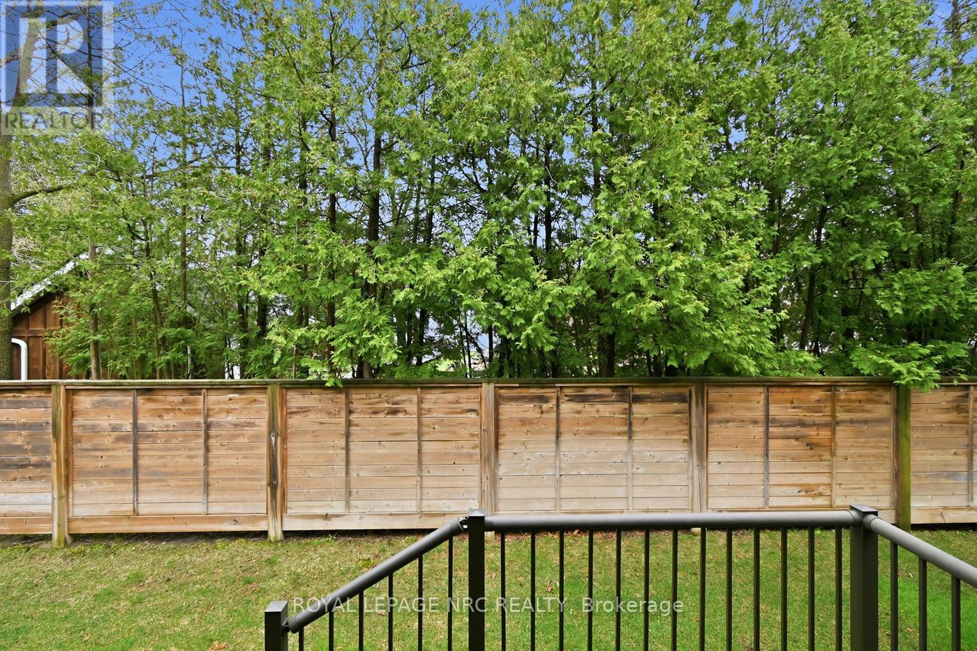 Private rear with mature greenery