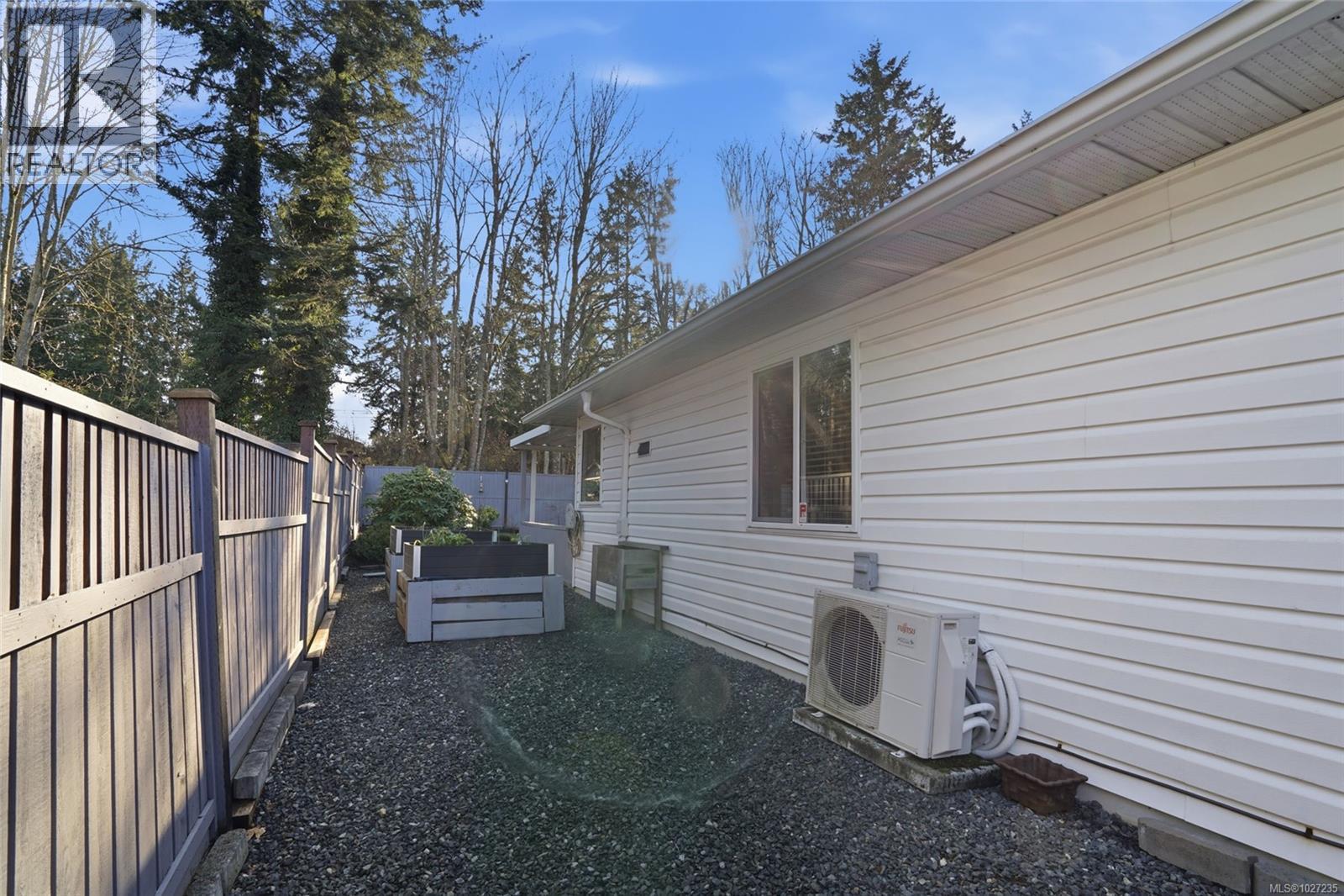 Ductless Heat pump. Raised vegetable beds for convenient and accessible gardening.