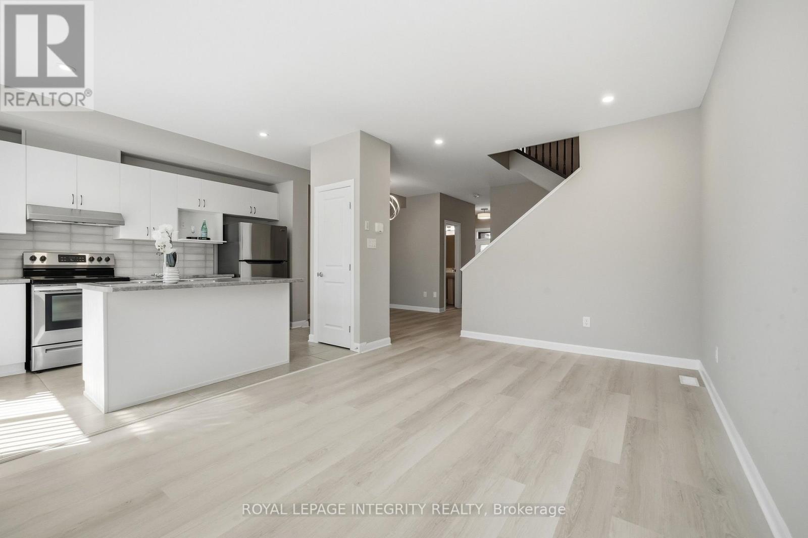 Spacious living room with serene, harmonious decor