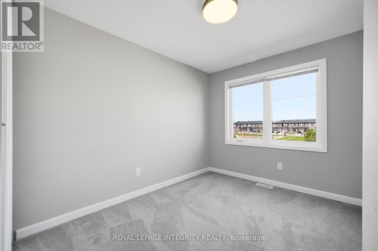 Bedroom 2 with large sunny window & nice view