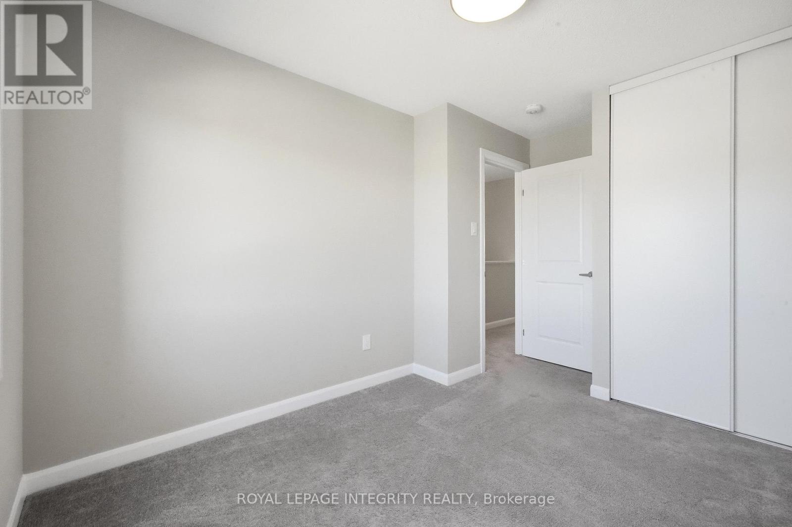 Bedroom 2 with Closets and New Light Fixture