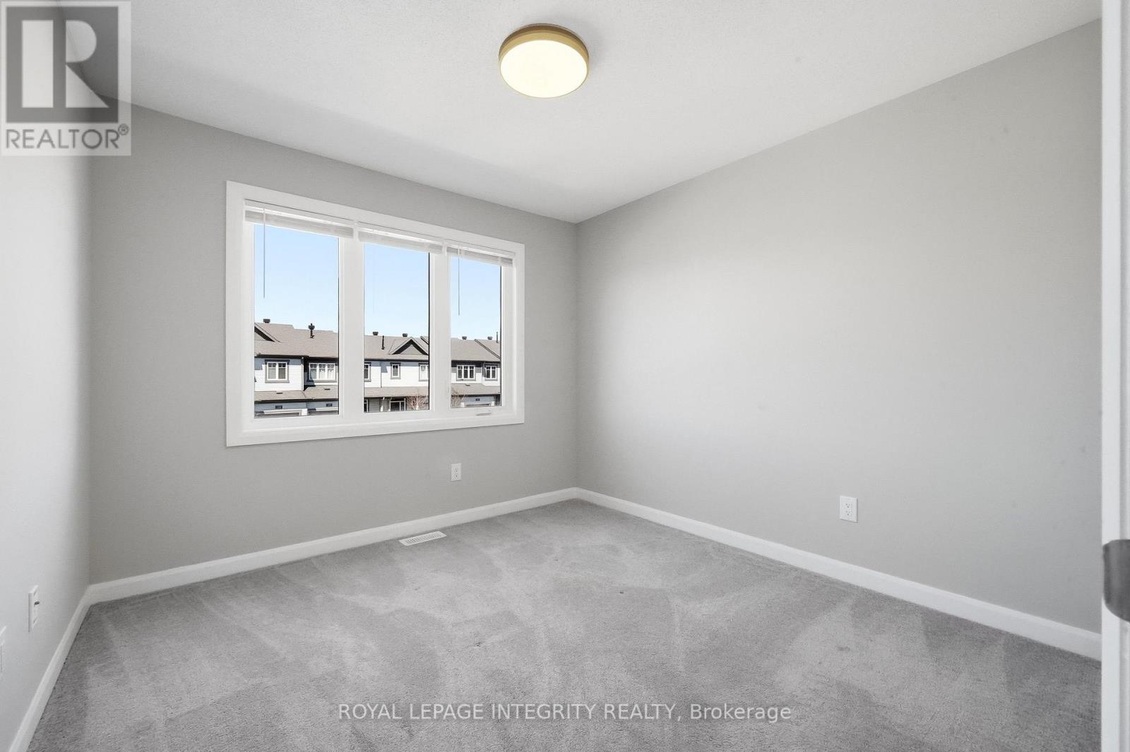 Bedroom 3 with Sunny Window and New Light Fixture