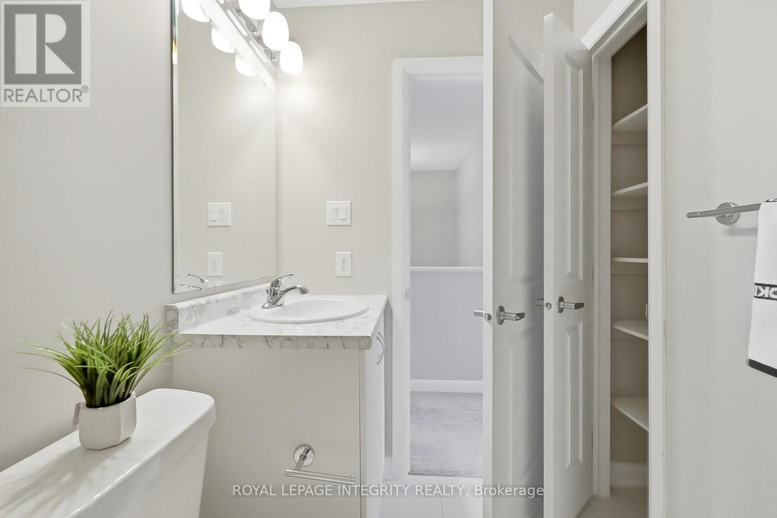 Main Bathroom with Spacious Linen Closet