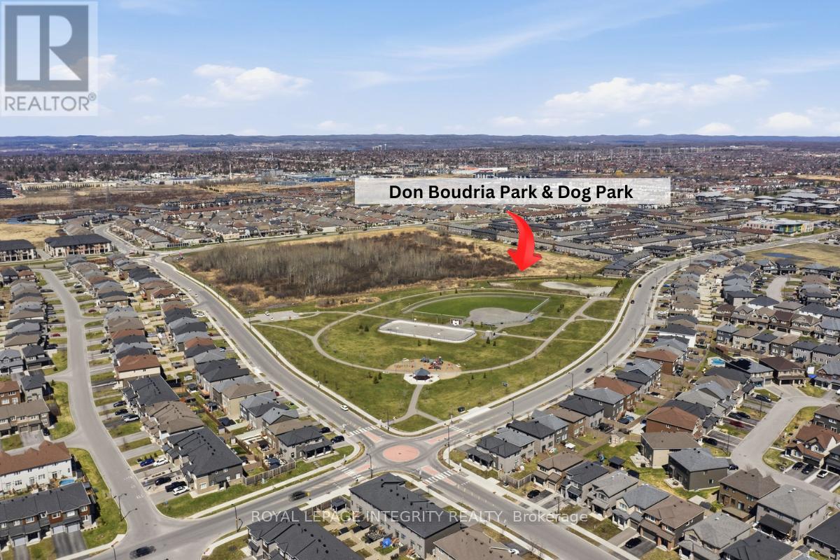 Nearby park with play area, courts & dog park