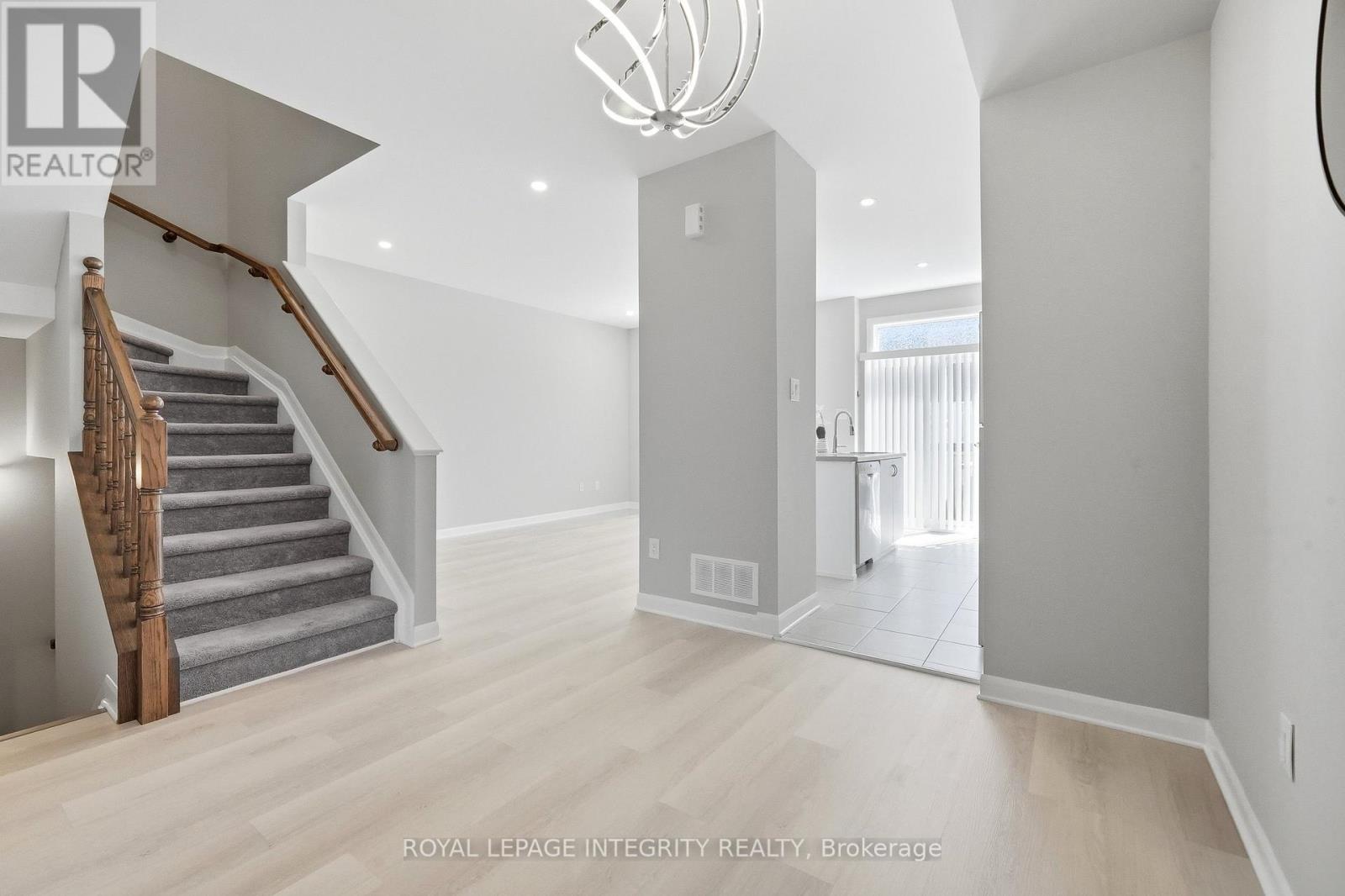 Open Concept with Gleaming Luxury Vinyl Flooring