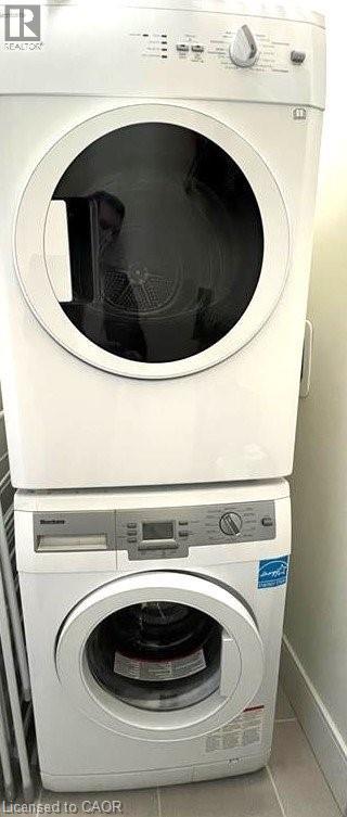 The property includes a stacked washer and dryer unit, featuring white finishes and front-loading doors