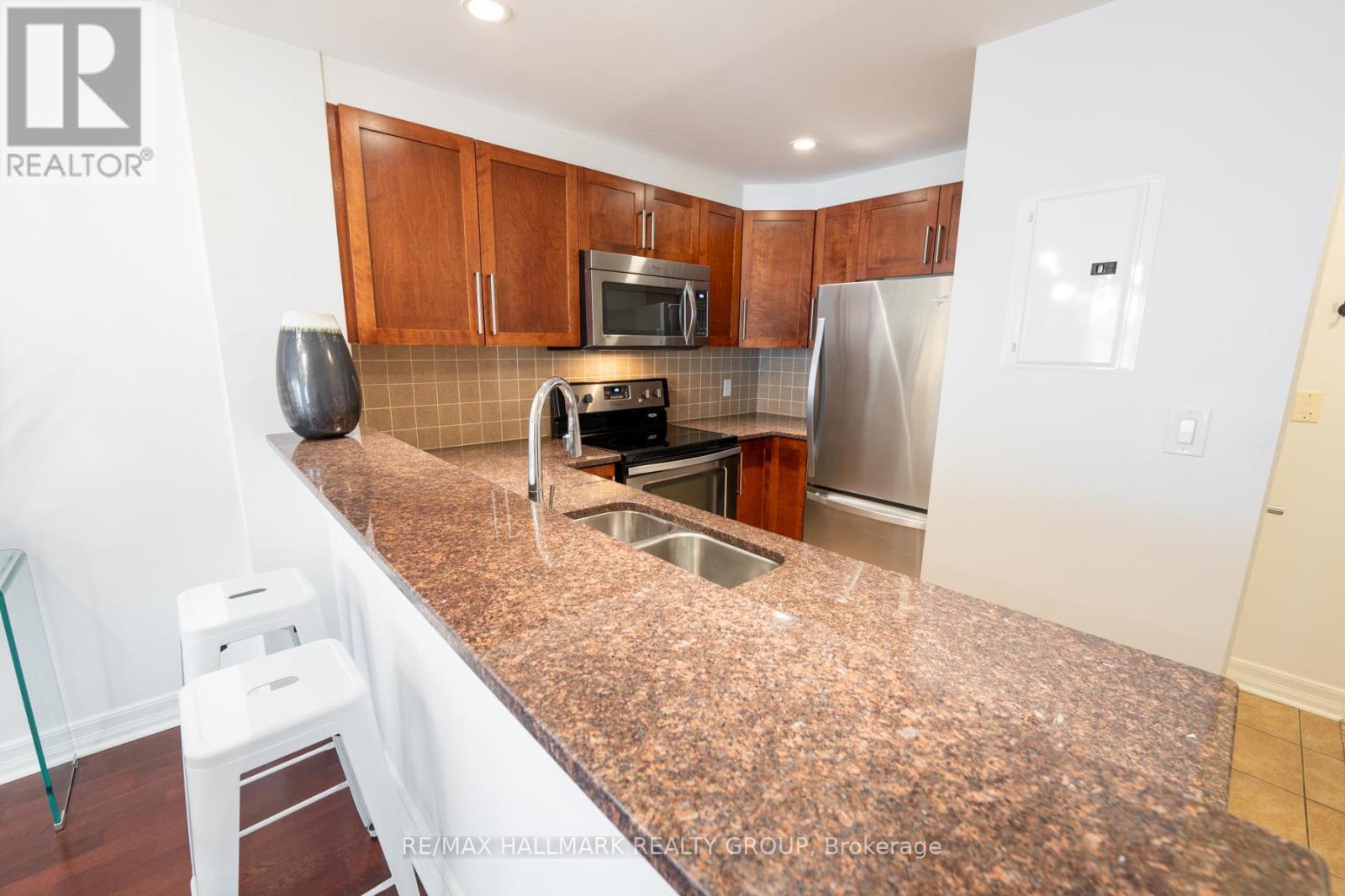 Kitchen with Granite Counters and SS Appliances
