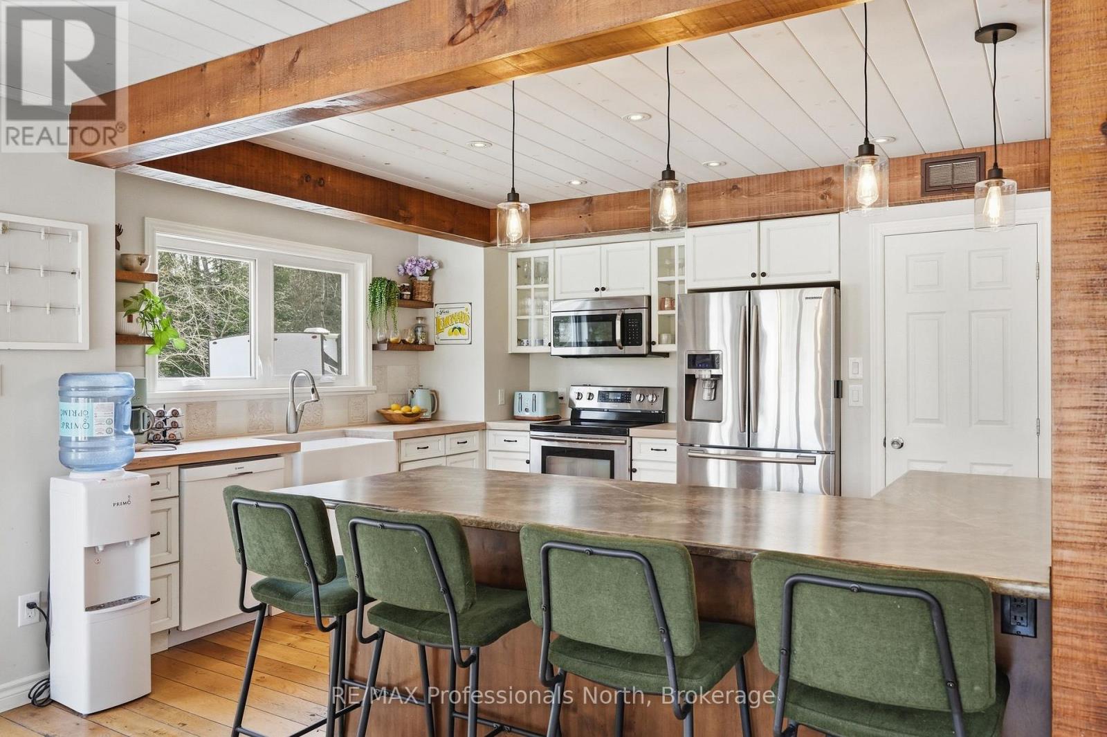 Stainless steel appliances and new light fixtures.