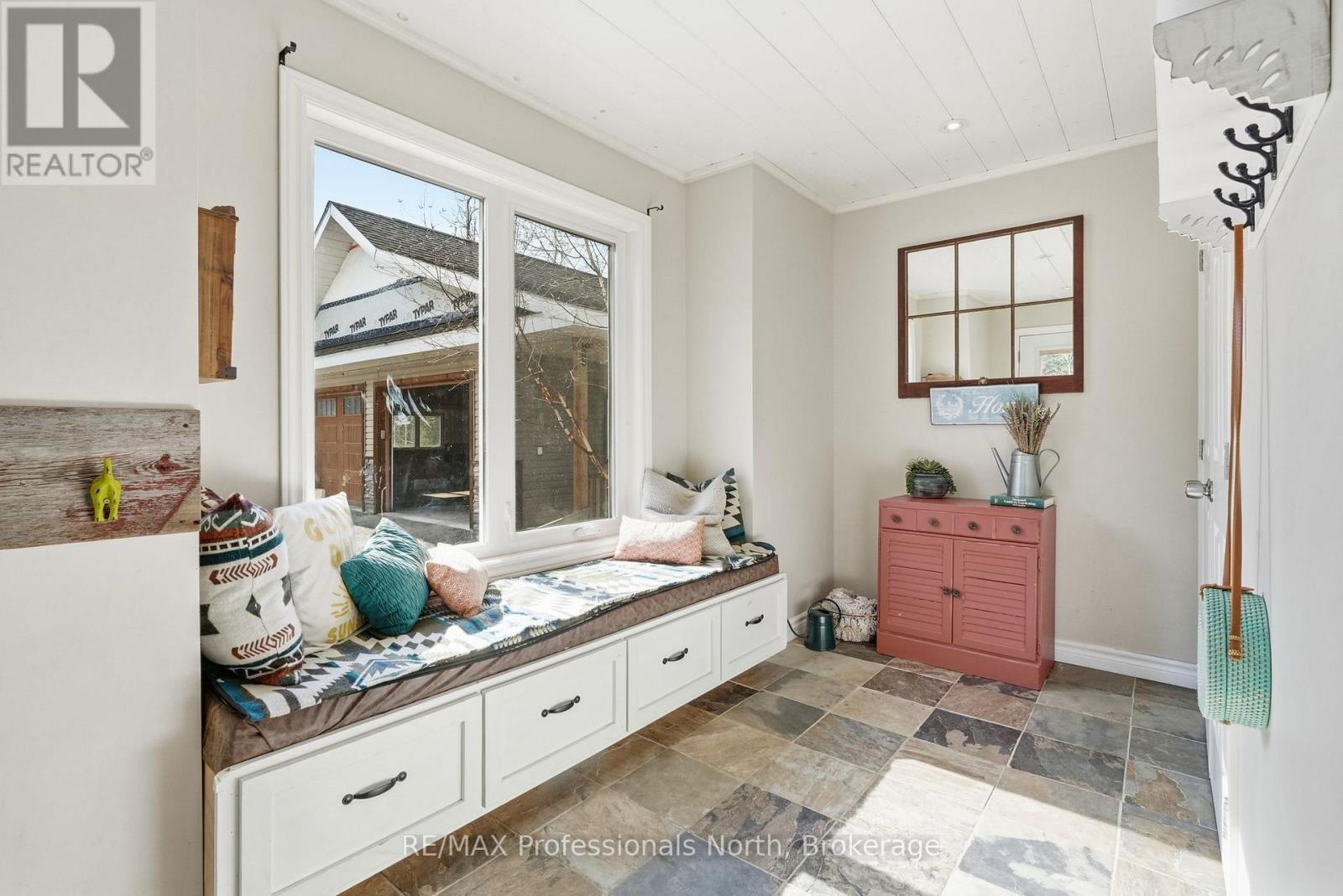 Front foyer entrance with storage.