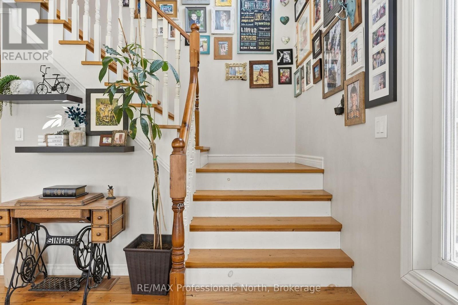 Open Pine Stairs to Upper level.