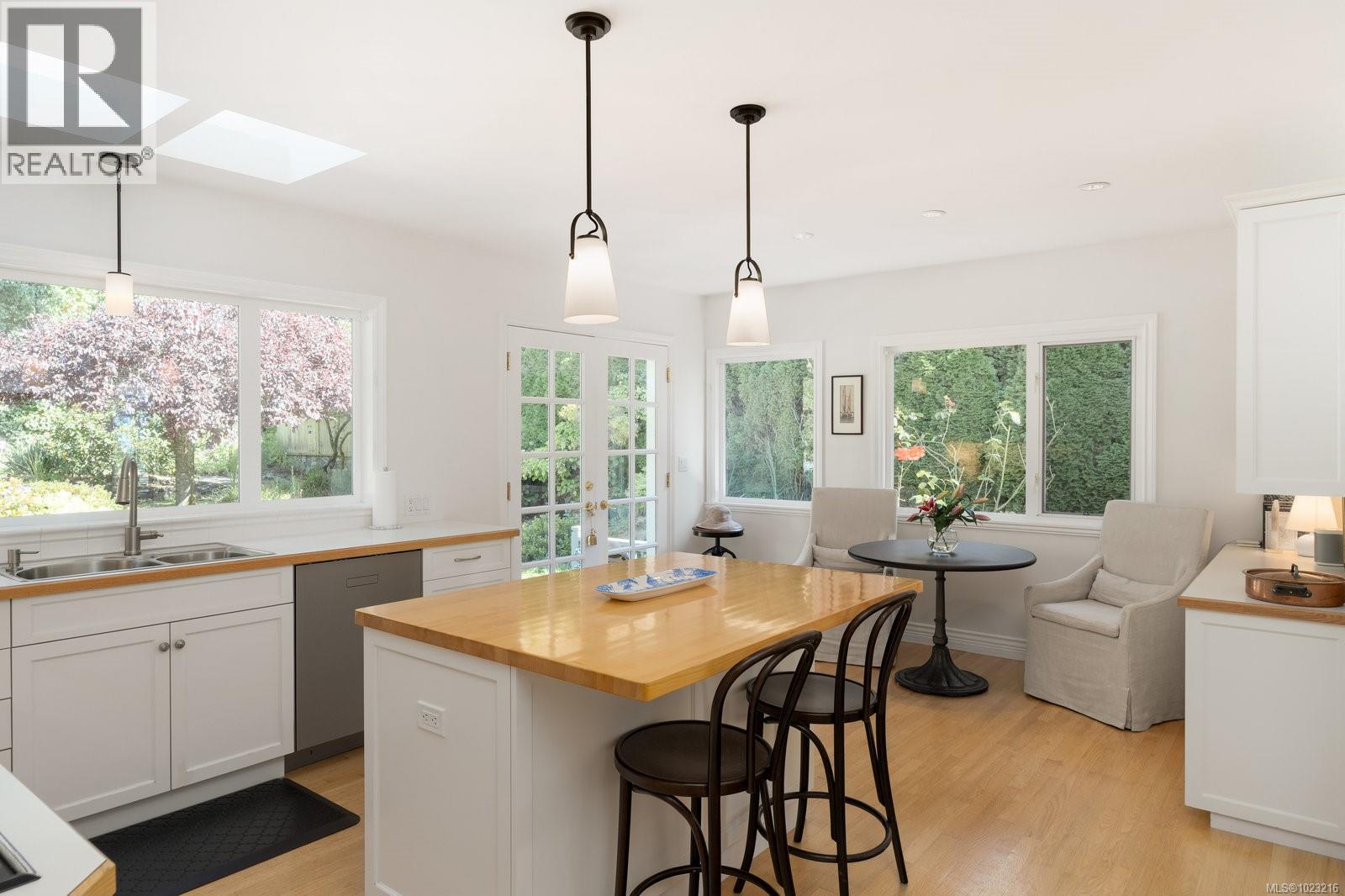 Breakfast nook complete with views of the private yard