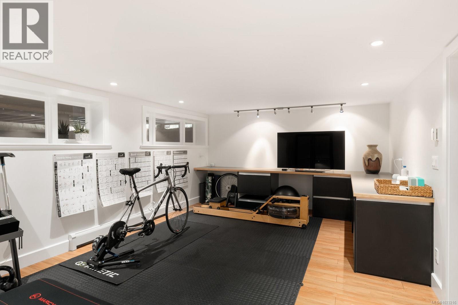 Dedicated home gym with space for cardio, weights, and more