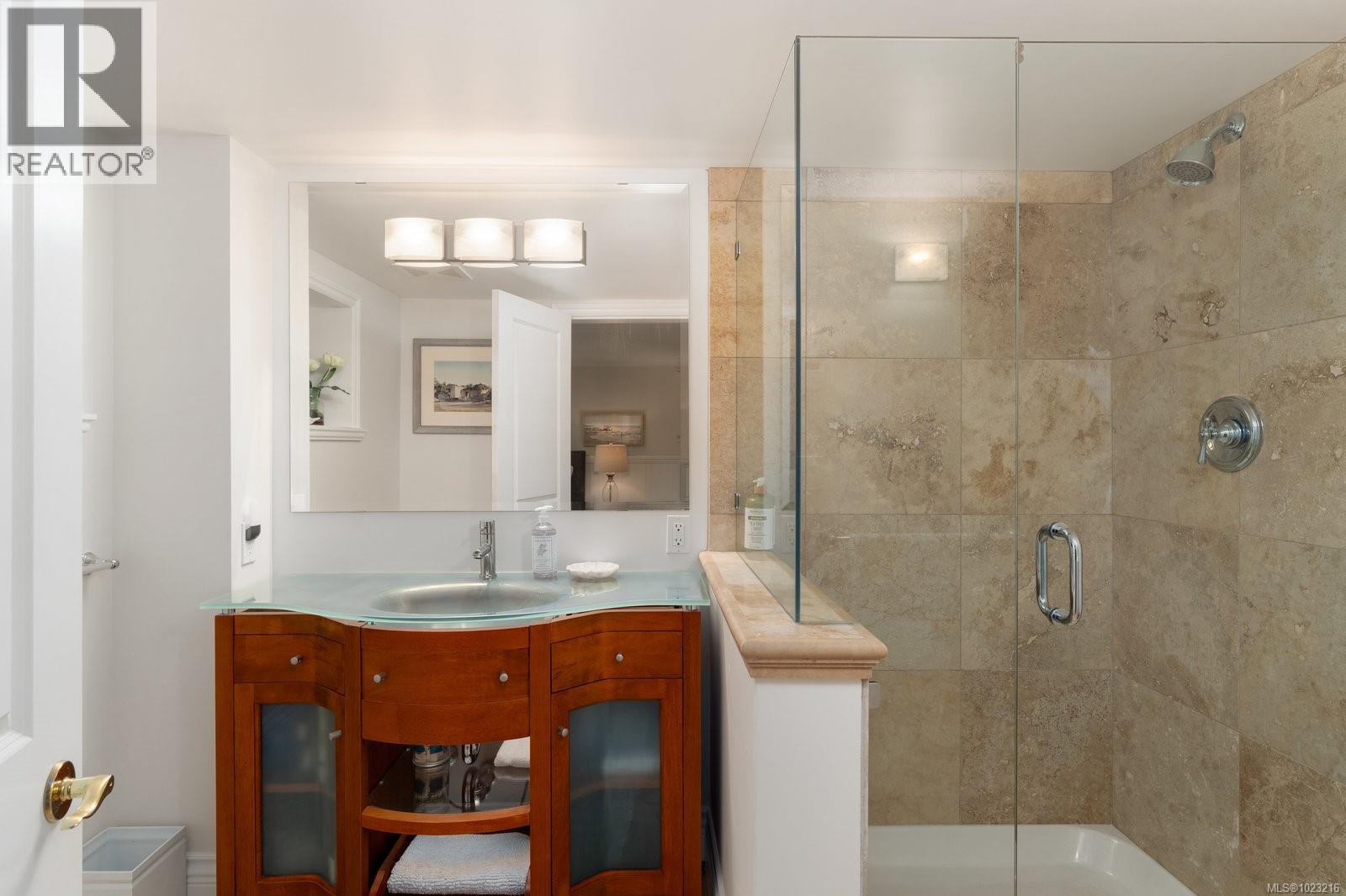 Elegant ensuite with a glass walk-in shower