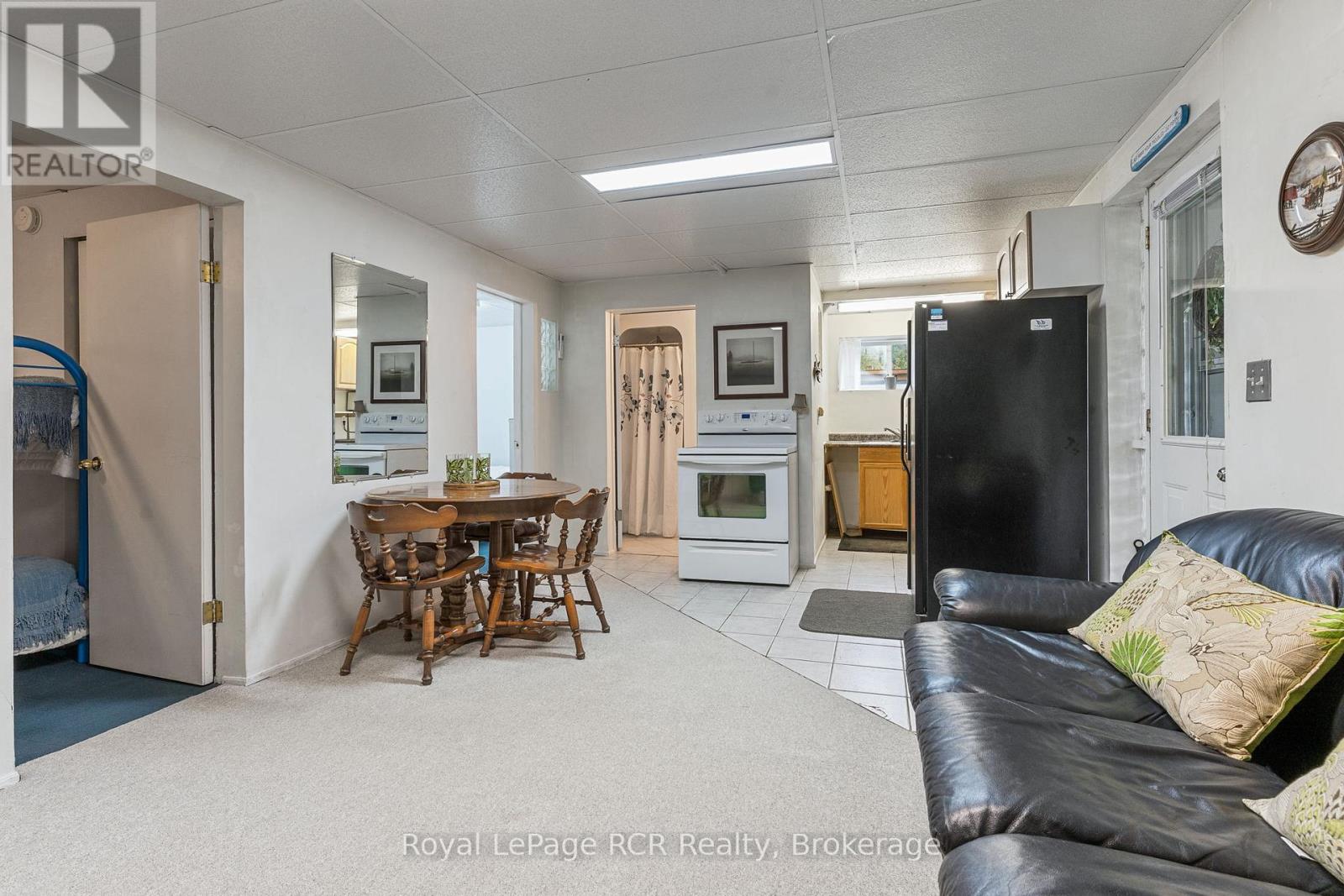 Lower Level Living area with kitchen and walkout