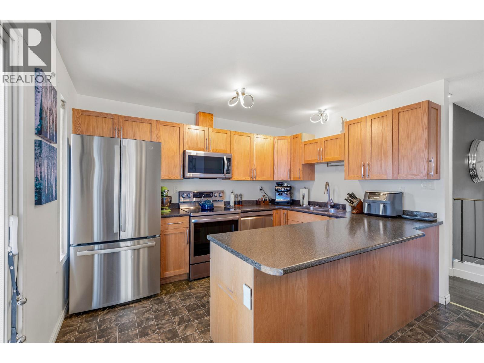 Photo 10 of 31 — 7703 MCMASTER CRESCENT · Prince George, BC