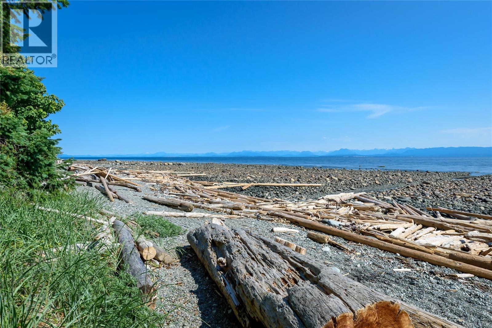 Public beach access at the end of June Rd, a short walk from the home and a quiet way to reach the shoreline most days of the week.