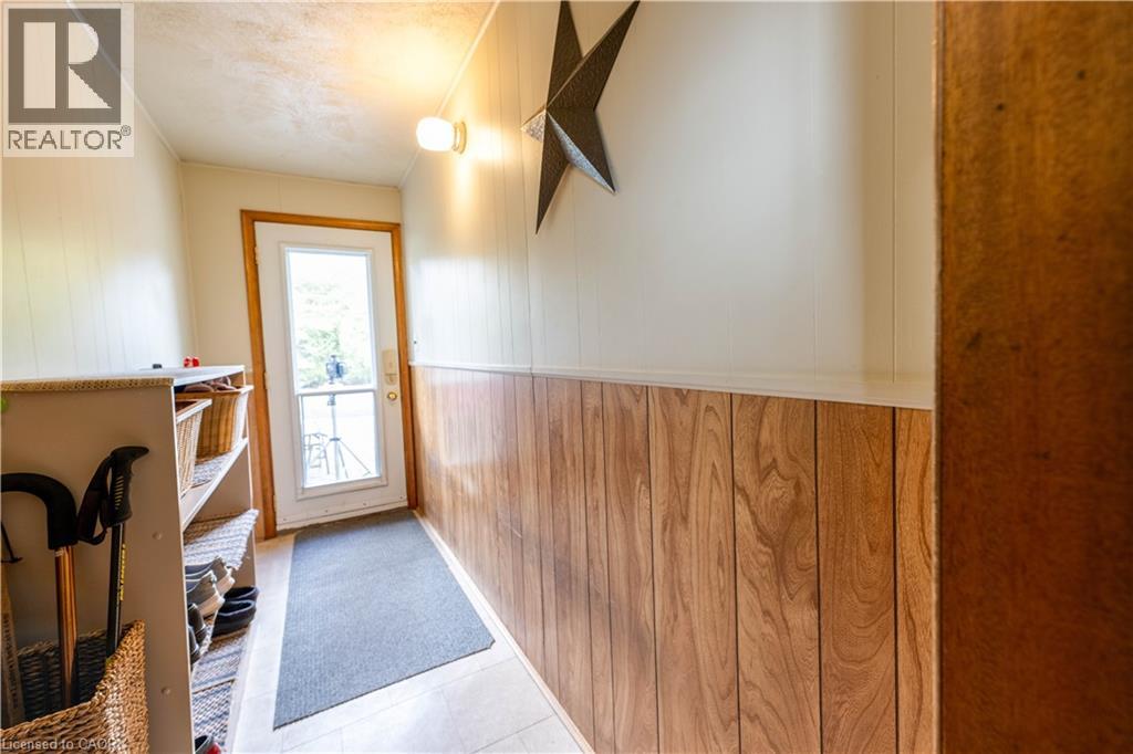 Walkout from the basement toward the driveway.