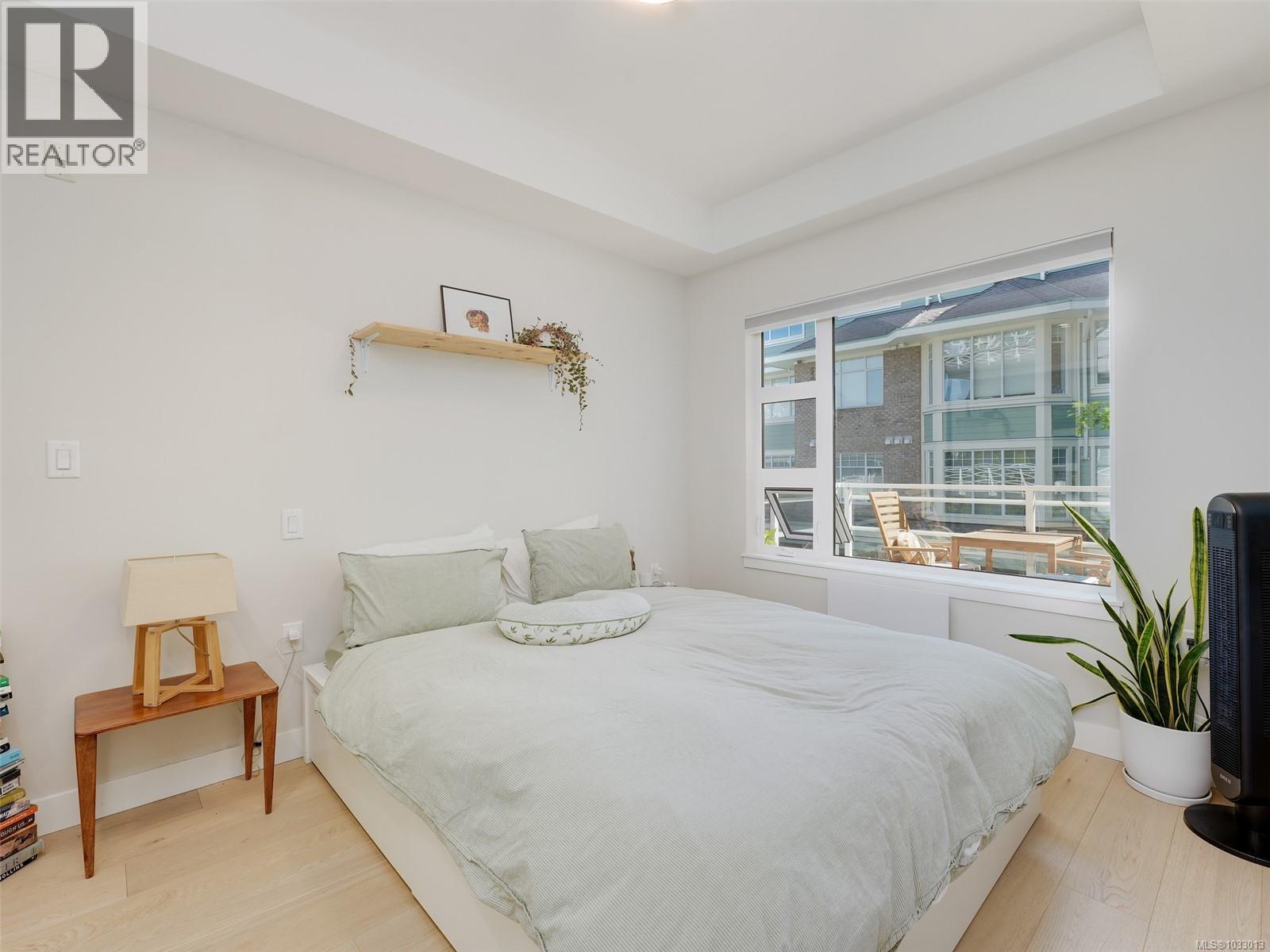 #206 9861 Third St - 11