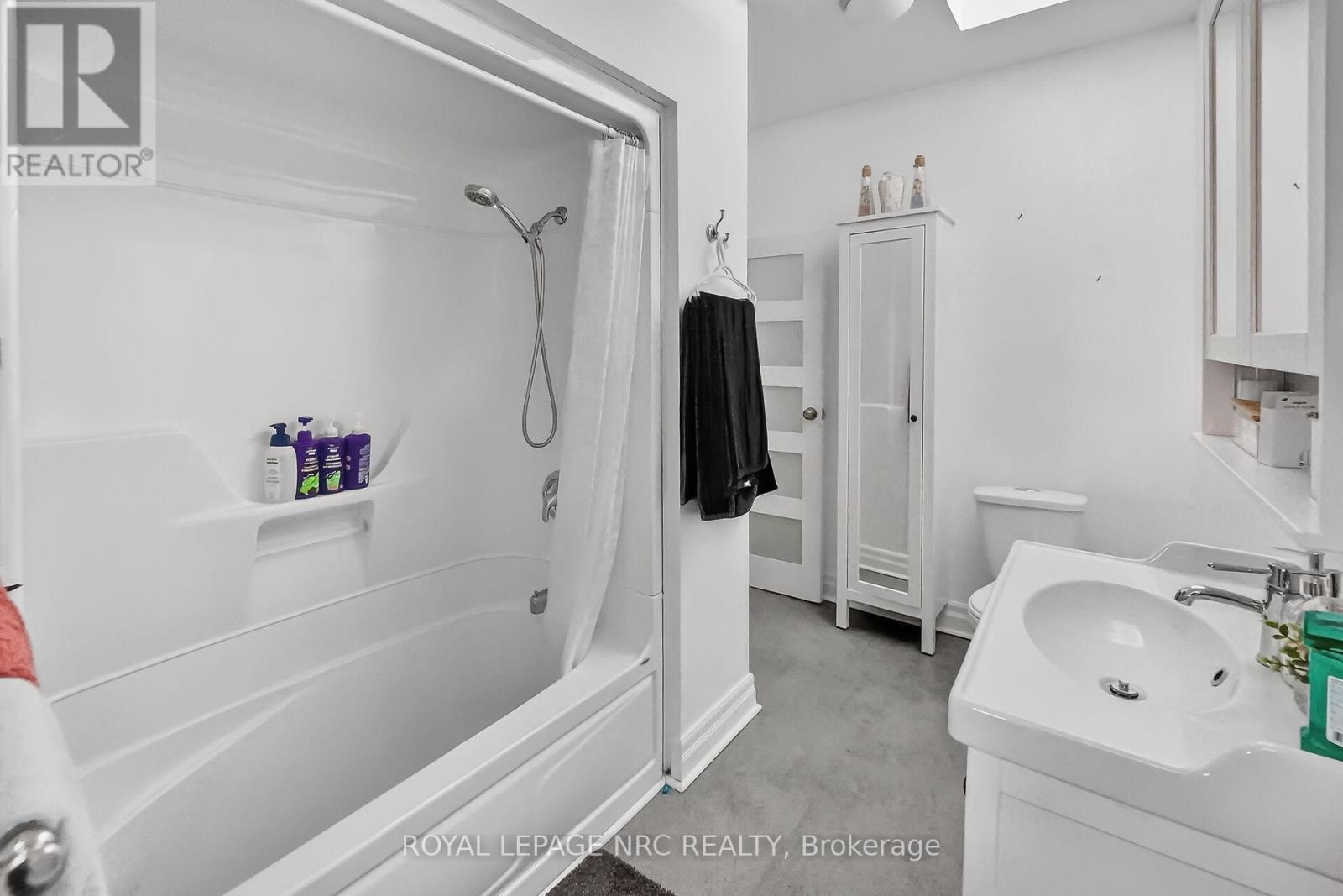 renovated generous 4 piece  bathroom upstairs