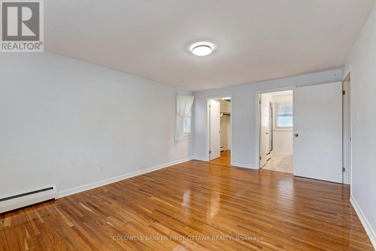 Primary suite access to walk-in closet & ensuite