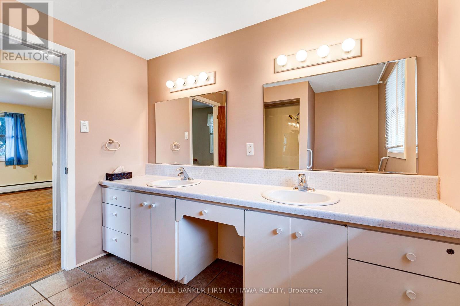 Five-piece bathroom has two sink vanity