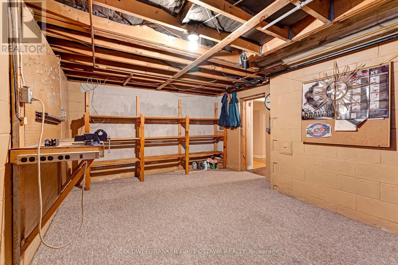 Workshop shelving and workbench included