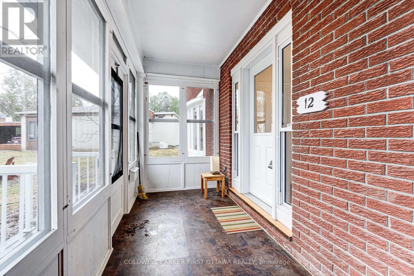 Classic enclosed porch welcomes you home